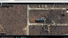 8930 Cape Breton Dr, Canadian Lakes, MI